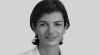 A black and white portrait of Esra Tasali