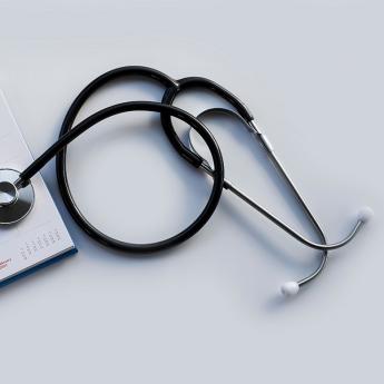 Stethoscope on top of calendar