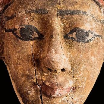 A 2,000 year old painted wood mask from an ancient Egyptian coffin. 