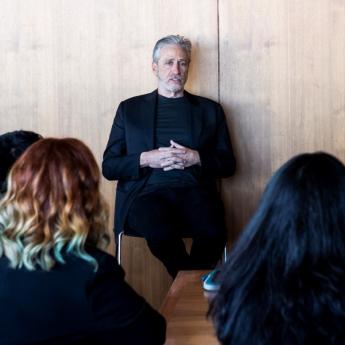 Jon Stewart talks with students