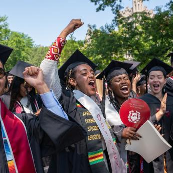 Graduates cheering at the 2023 Convocation ceremony