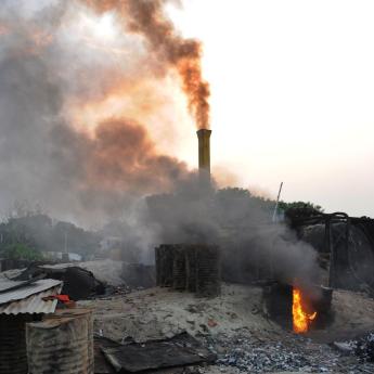 Road construction blackens sky in Dhaka, Bangladesh 