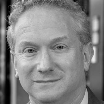 A black and white photo of Prof. Jonathan Masur
