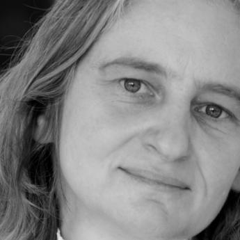 A black and white photo of Prof. Mary Anne Case