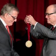 Booth receiving medal