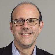 MIchael Kremer photograph smiling at camera