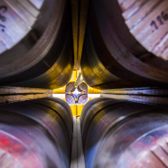 peering down a row of gigantic magnets in a diamond shape