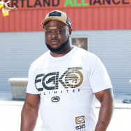 Sylvester, a beneficiary of the READI Chicago initiative, stands outside a Heartland Alliance building in Chicago